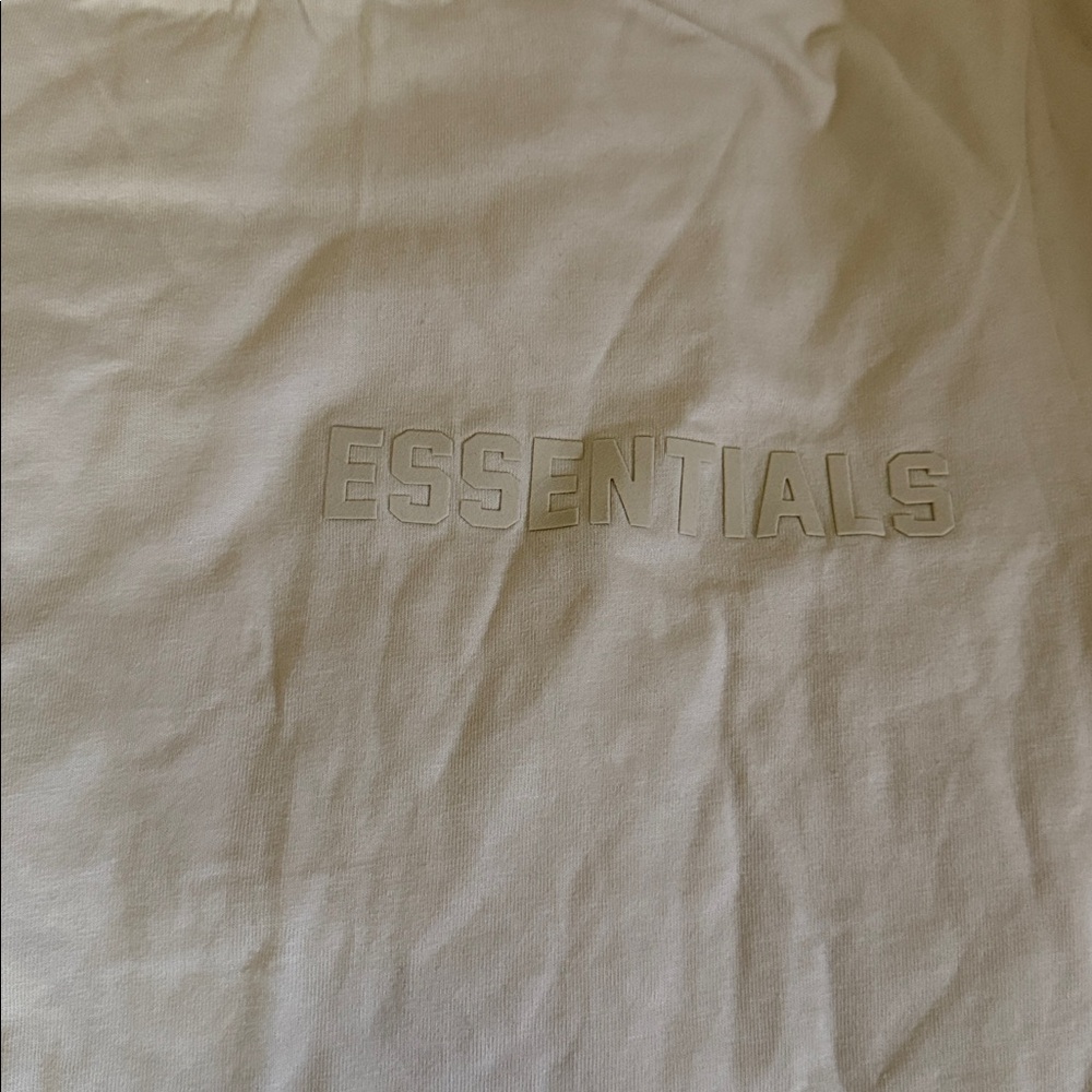 Essentials Raised Logo T‑Shirt in Cream - Picture 2 of 3